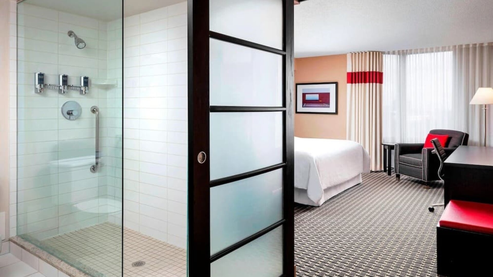 King room with guest bathroom at Four Points By Sheraton Mississauga Meadowvale.