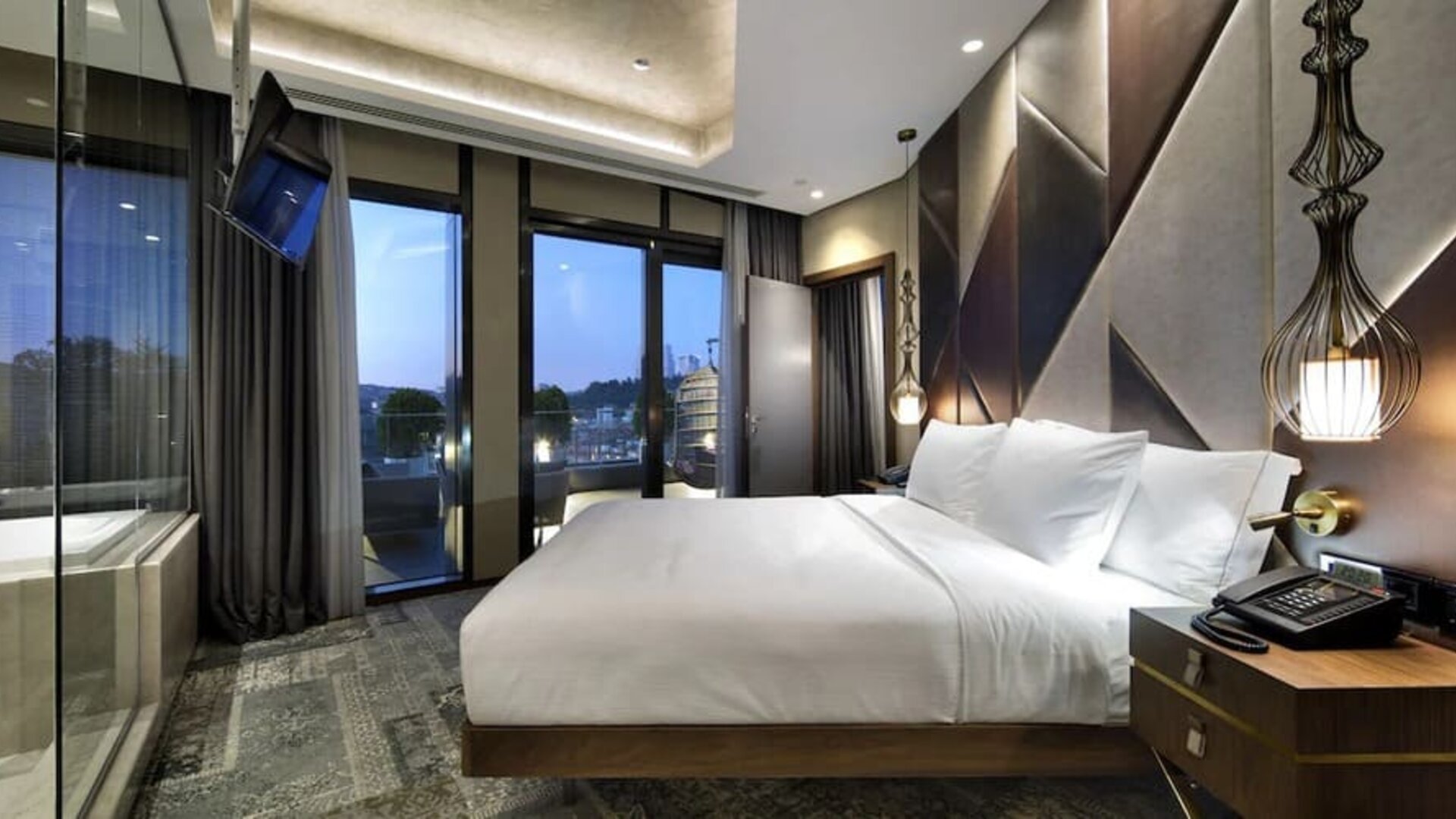 Stunning king suite with large windows at DoubleTree By Hilton Istanbul - Piyalepasa.