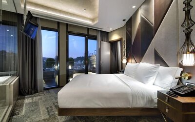 Stunning king suite with large windows at DoubleTree By Hilton Istanbul - Piyalepasa.