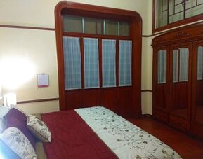 Cozy day use room at Casa María Hostal.