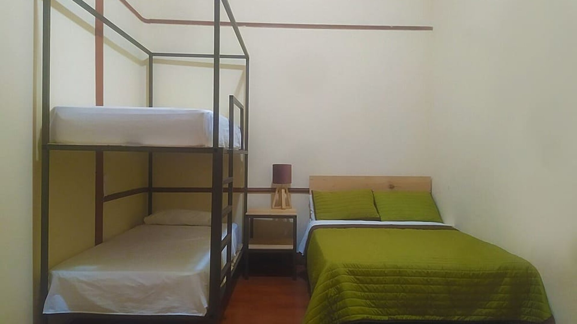 Quadruple room at Casa María Hostal.