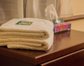 Towels provided at Casa María Hostal.