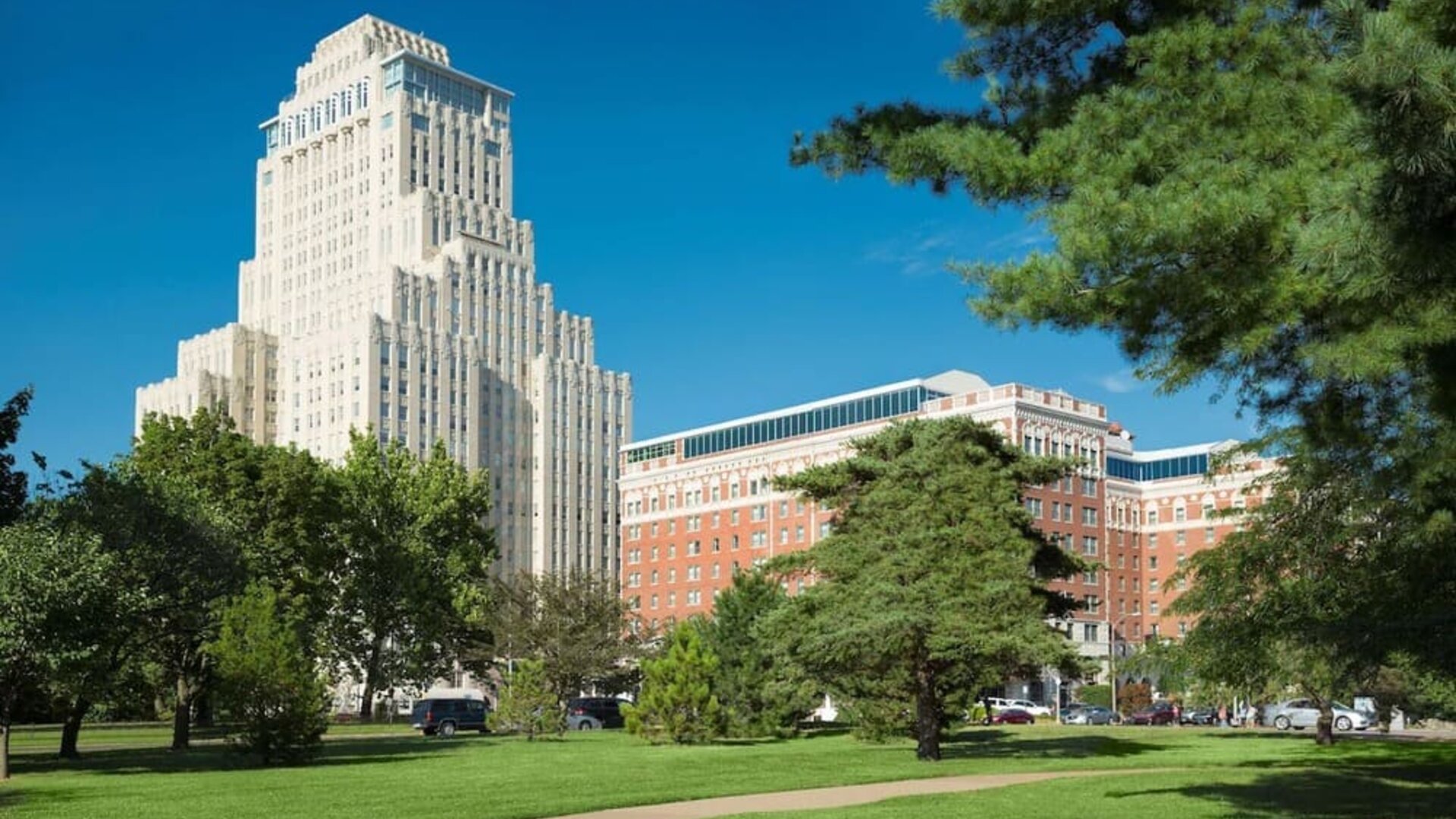 Hotel exterior with garden at The Chase Park Plaza Royal Sonesta St. Louis.