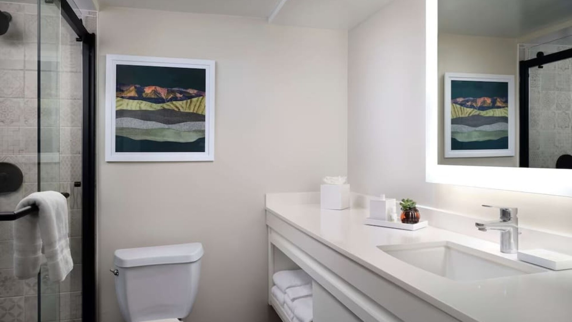 Guest bathroom with shower at Sonesta Irvine.