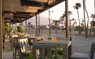 Outdoor eating area at Sonesta Redondo Beach & Marina.