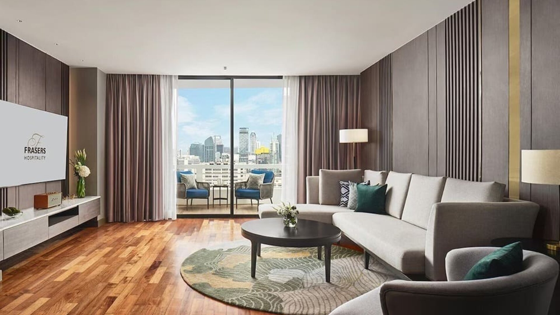 Beautiful king room with lounge and terrace at Fraser Suites Sukhumvit, Bangkok.