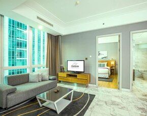 Spacious day yse room with lounge at Fraser Residence Sudirman Jakarta.