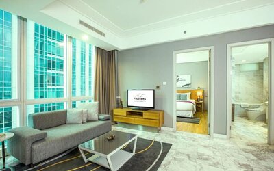 Spacious day yse room with lounge at Fraser Residence Sudirman Jakarta.