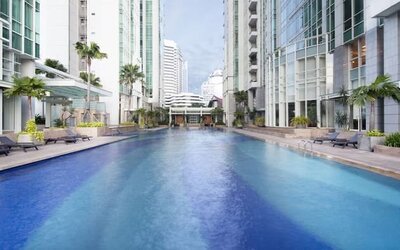 Luxurious outdoor pool at Fraser Residence Sudirman Jakarta.