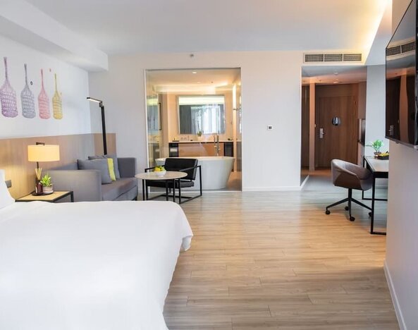 Delux king room with TV at Modena By Fraser Bangkok.