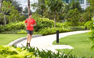 Running outdoors in the garden at Fraser Place Setiabudi Jakarta.