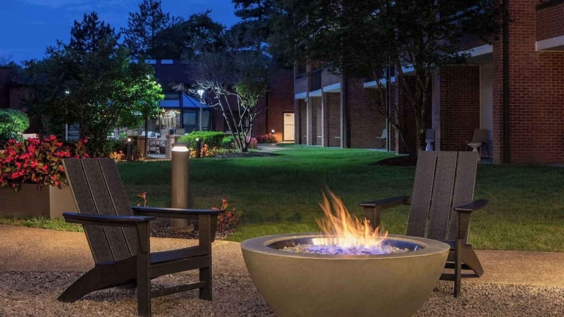 Outdoor seating and fire pit at Sonesta Select Boston Foxborough Mansfield.