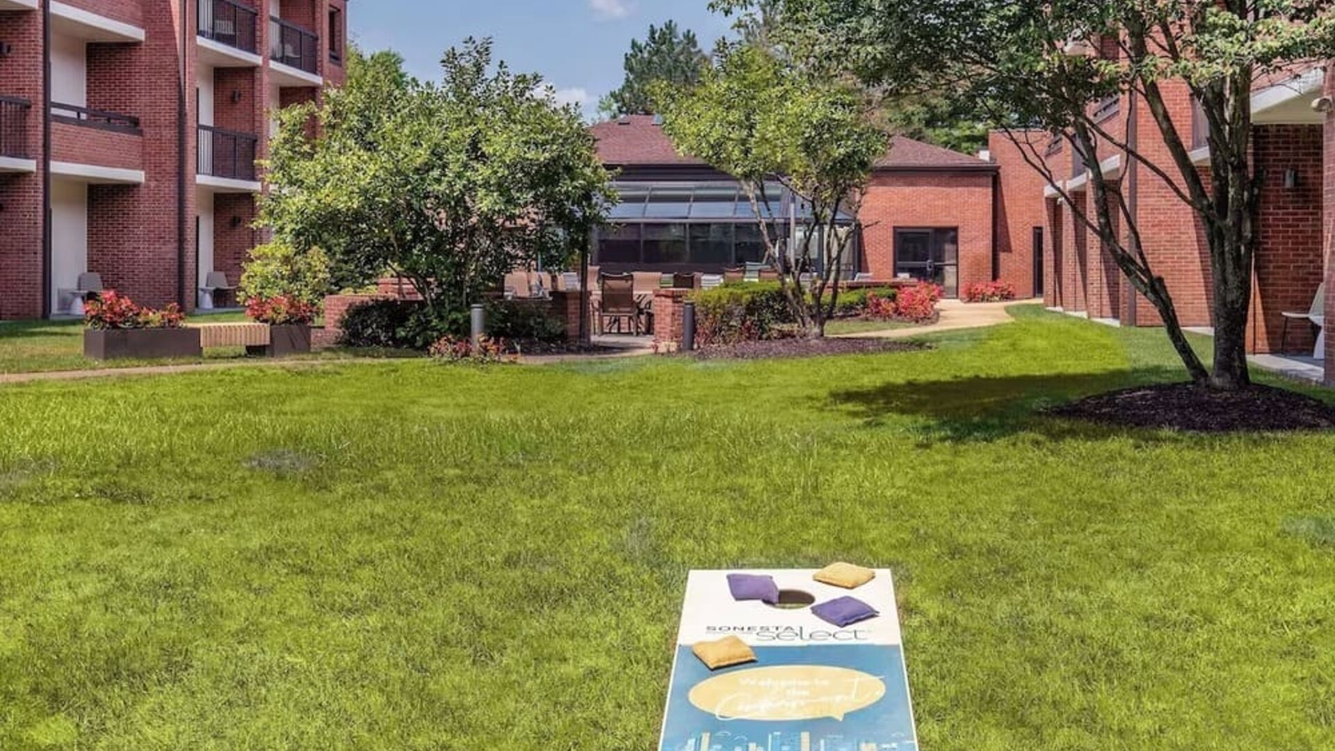 Outdoor garden and yoga space at Sonesta Select Boston Foxborough Mansfield.
