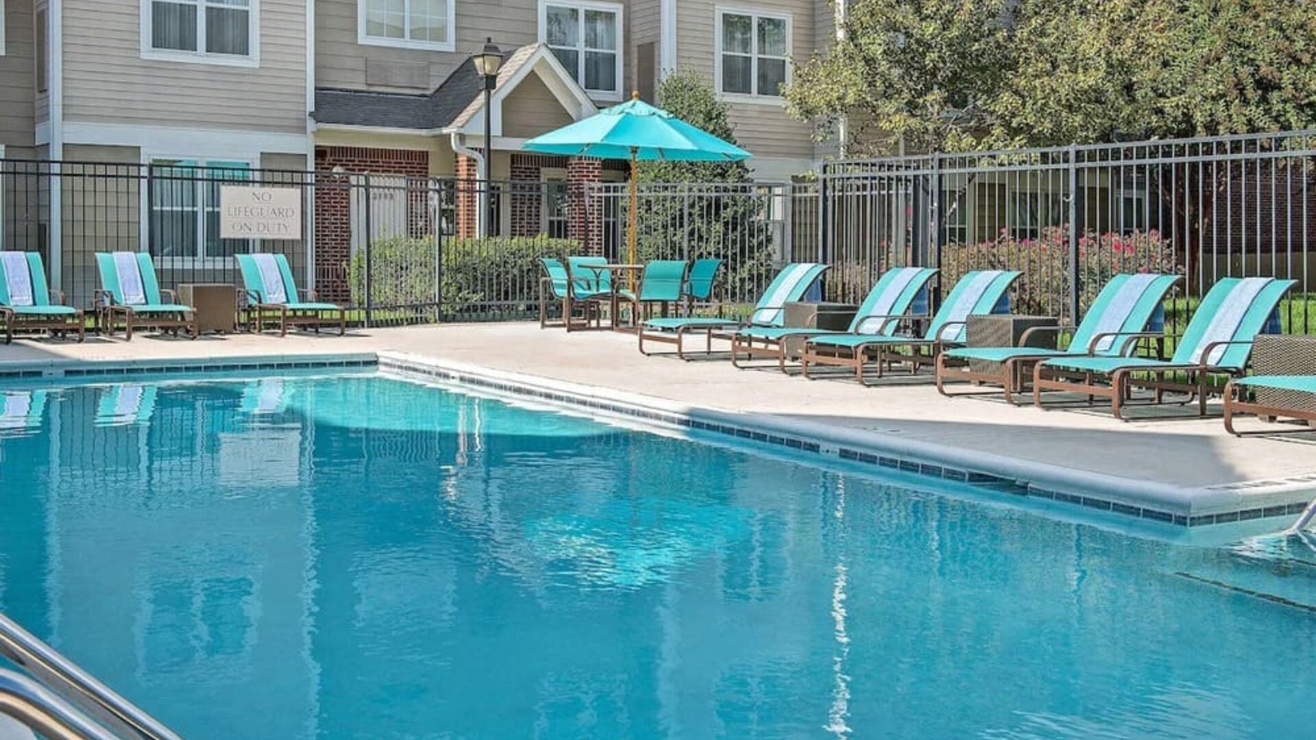 Outdoor pool at Sonesta ES Suites Raleigh Durham Airport Morrisville.