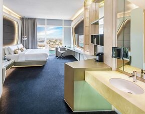Luxurious king room with private bathroom at V Hotel Dubai.