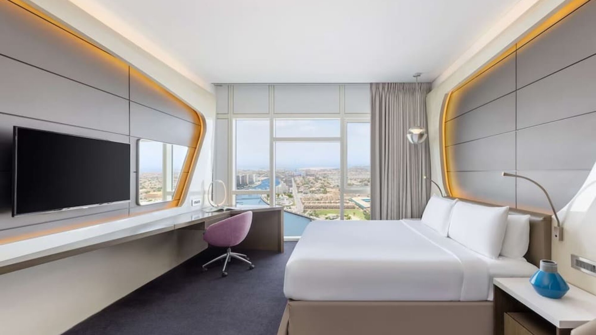 Day use room wit TV and work station at V Hotel Dubai.