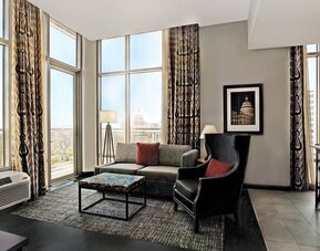 Spacious king room with natural light at Hampton Inn & Suites Austin @ The UniversityCapitol.