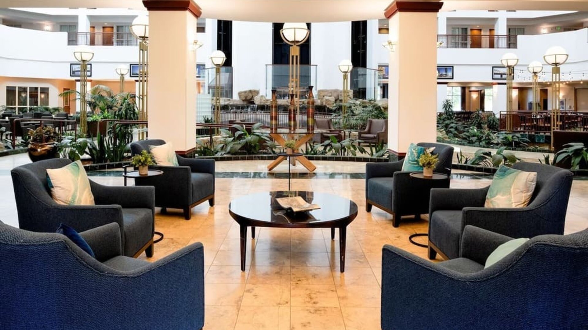 Coworking space and lobby at Embassy Suites By Hilton Portland Airport.