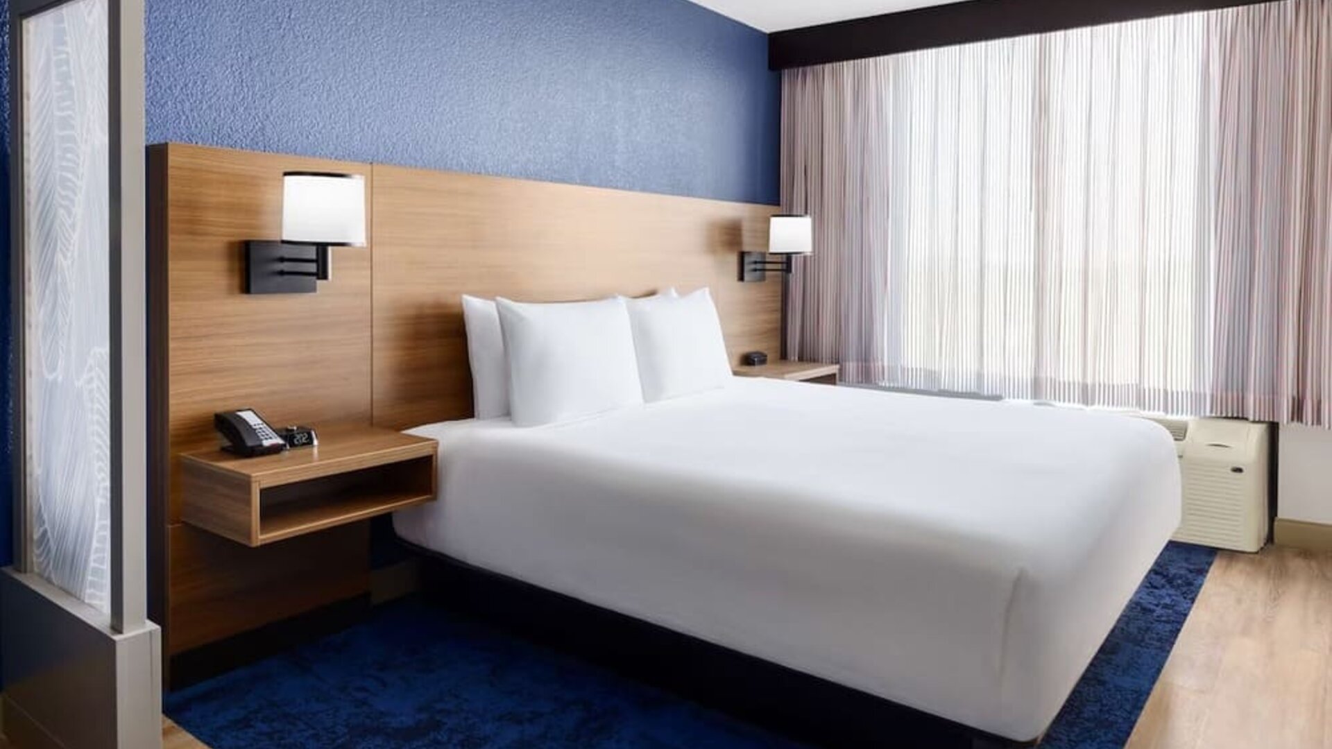 King room with natural light at Hyatt Place Orlando I-Drive.