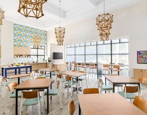 Dining room at Hyatt Place Orlando I-Drive.