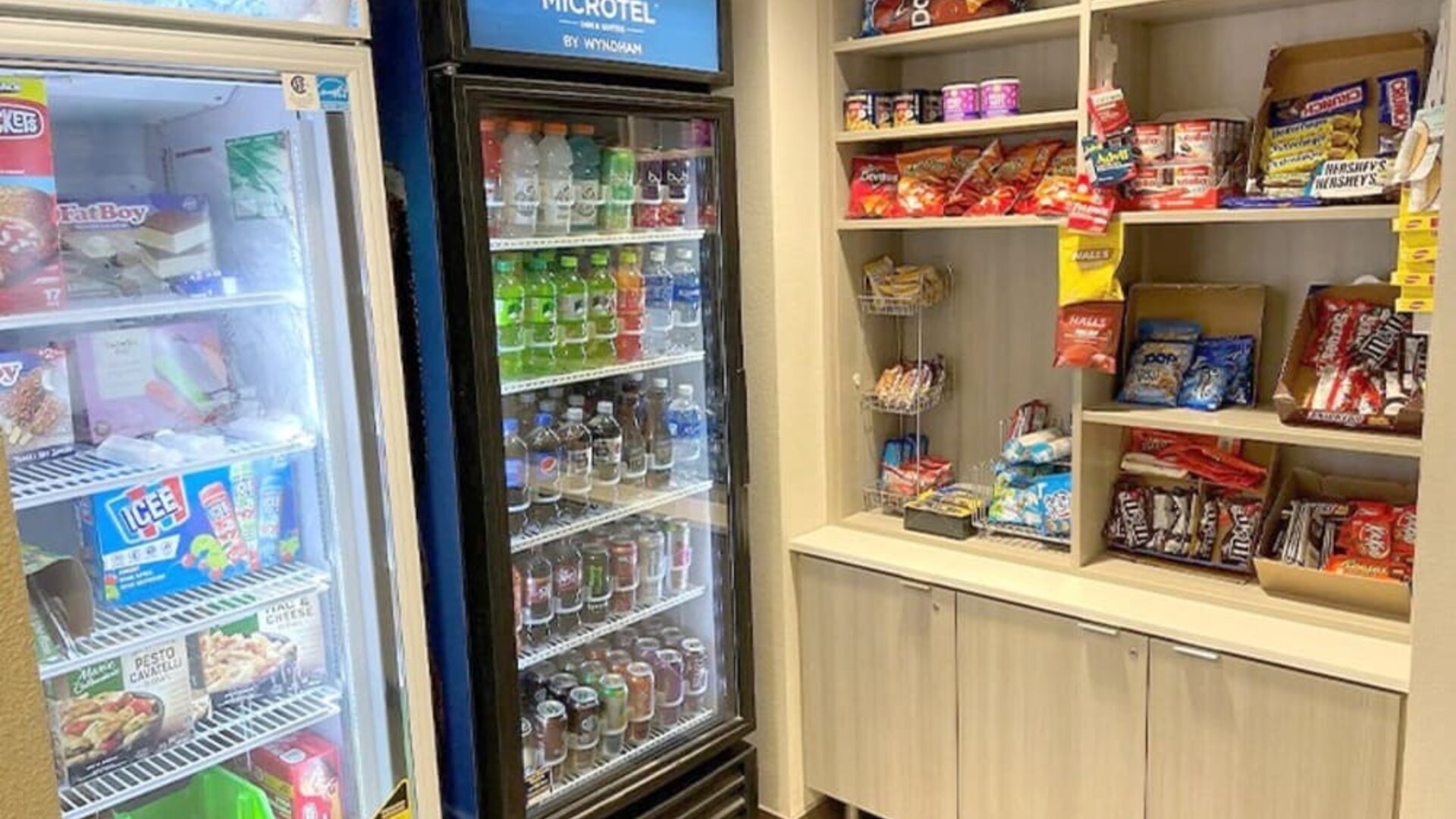 Snack bar at Coratel Inn & Suites By Jasper Rochester.