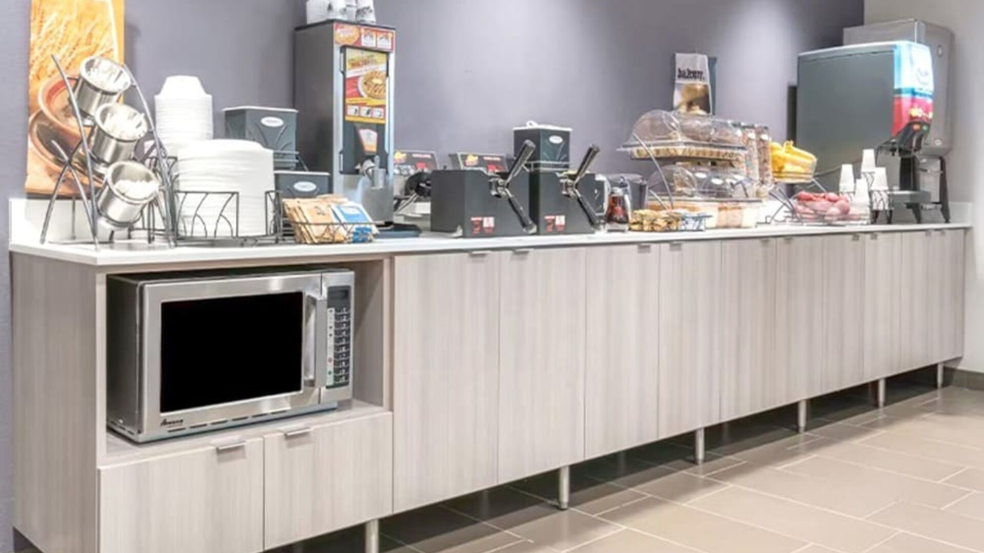 Breakfast available at Coratel Inn & Suites By Jasper Rochester.