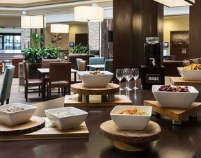 Dining room at Embassy Suites By Hilton Denver Tech Center.