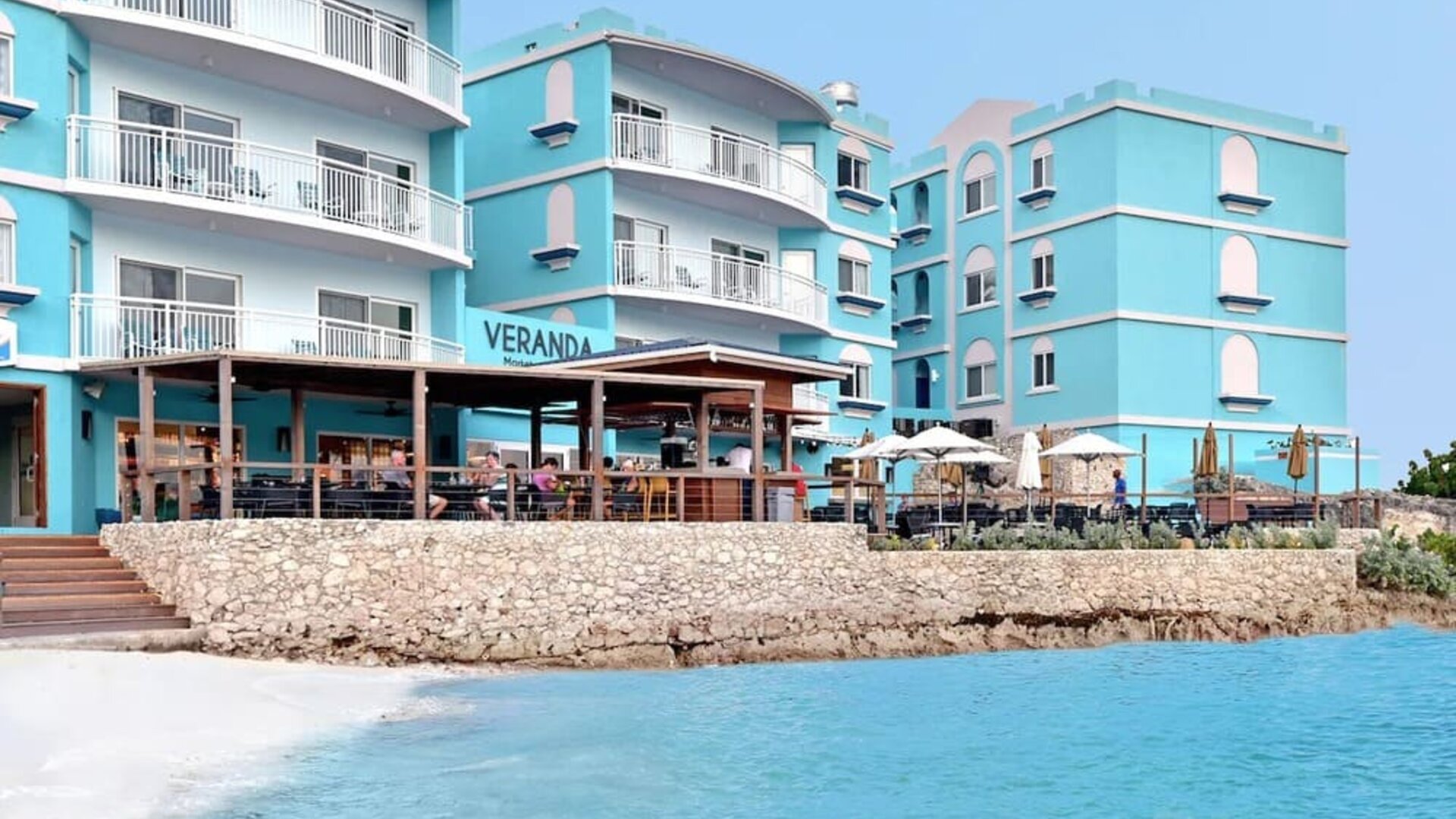 Hotel exterior overlooking the ocean at Oyster Bay Beach Resort.