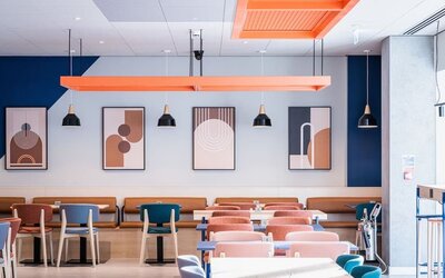 Coworking and dining space at Ibis Budget Manchester Airport.