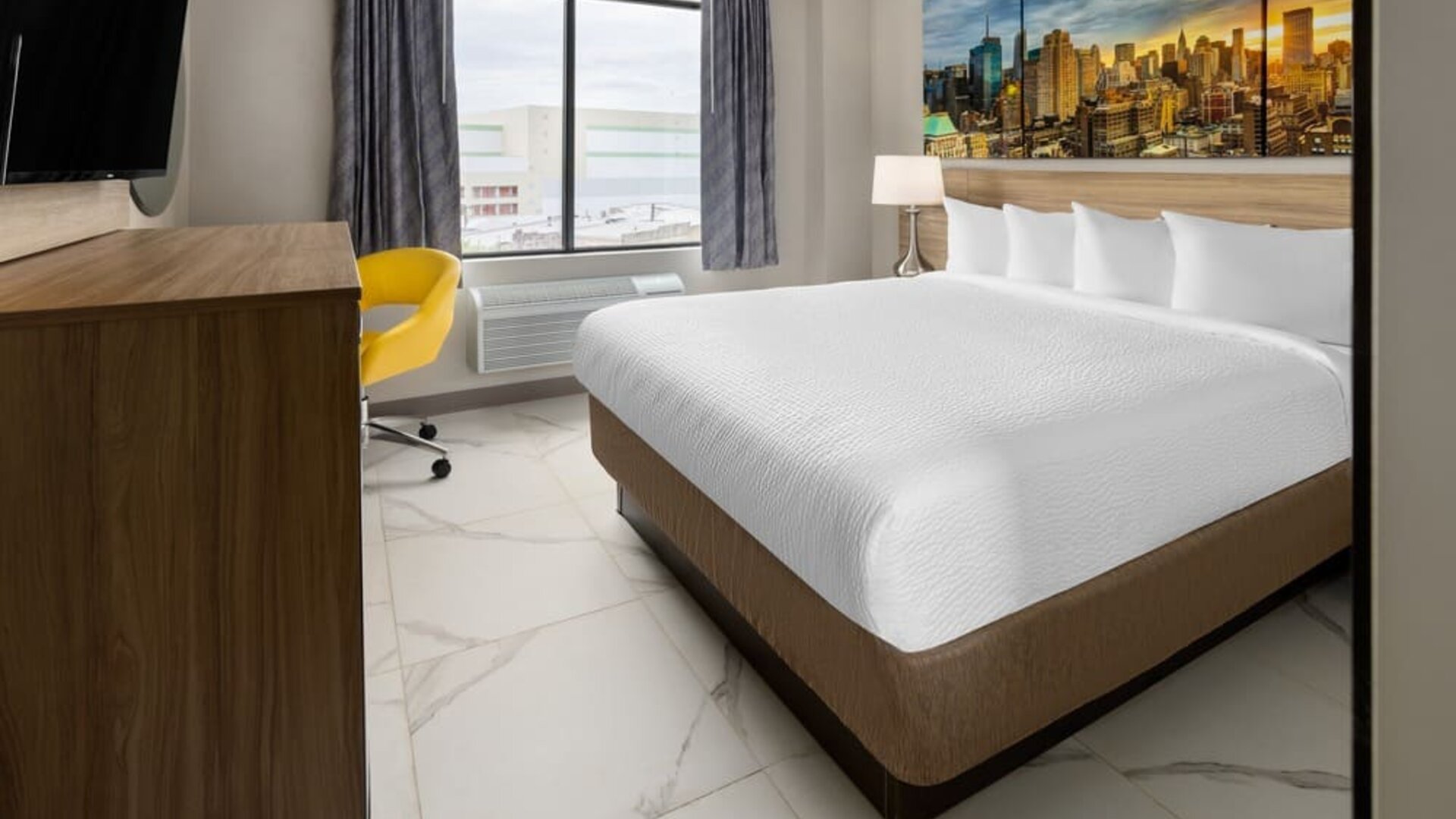 King room with natural light at Days Inn By Wyndham Staten Island.