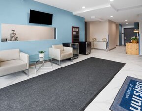 Hotel lobby at Days Inn By Wyndham Staten Island.