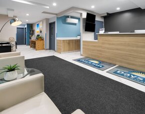 Hotel lobby and lounge at Days Inn By Wyndham Staten Island.