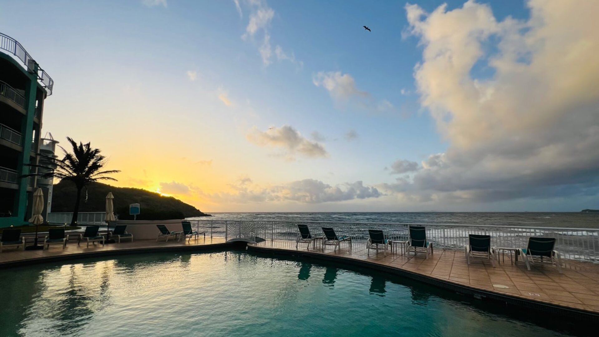 Sunset reflecting off the waters of the Infinity Pool at the Oyster Bay Resort in St. Maarten.