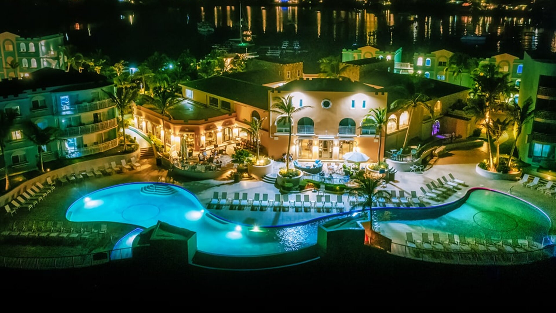 Nighttime lights of the Infinity Pool at Oyster Bay Resort in St. Maarten.