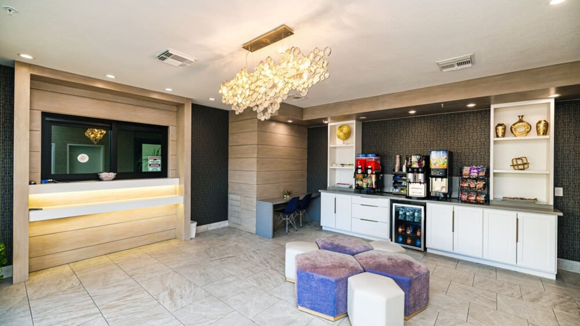 Lobby and lounge area at Palace Inn Blue IAH East.