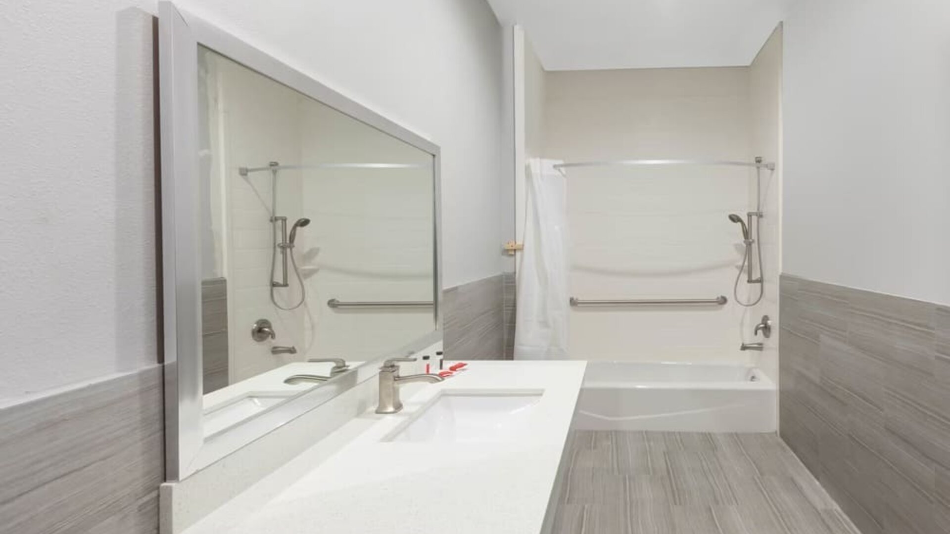 Guest bathroom at Baymont By Wyndham Houston Hobby Airport.