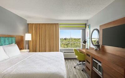 Day use room with work desk and natural light at Hampton Inn & Suites Ft. Lauderdale Airport/South Cruise Port.