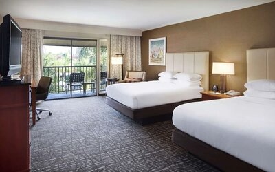 Two queen beds with balcony at DoubleTree By Hilton Ontario Airport.