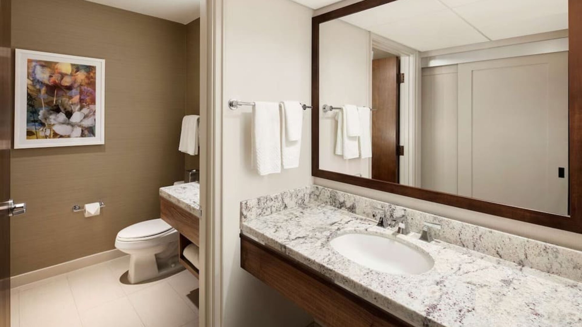 Day room with guest bathroom at DoubleTree By Hilton Ontario Airport.