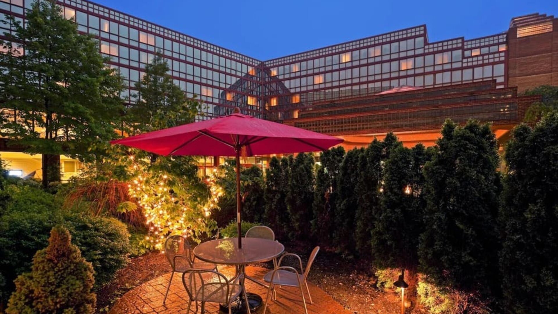 Outdoor terrace at Laguardia Plaza Hotel.