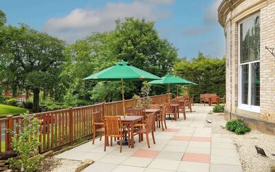 Hotel terrace and garden at Elmbank York, Tapestry Collection By Hilton.