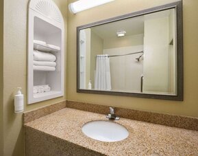 Guest bathroom with shower at Hotel Marguerite.