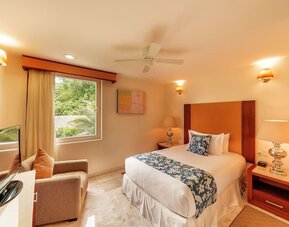 Romantic day use room with TV at Grand Miramar All Luxury Suites & Residences.