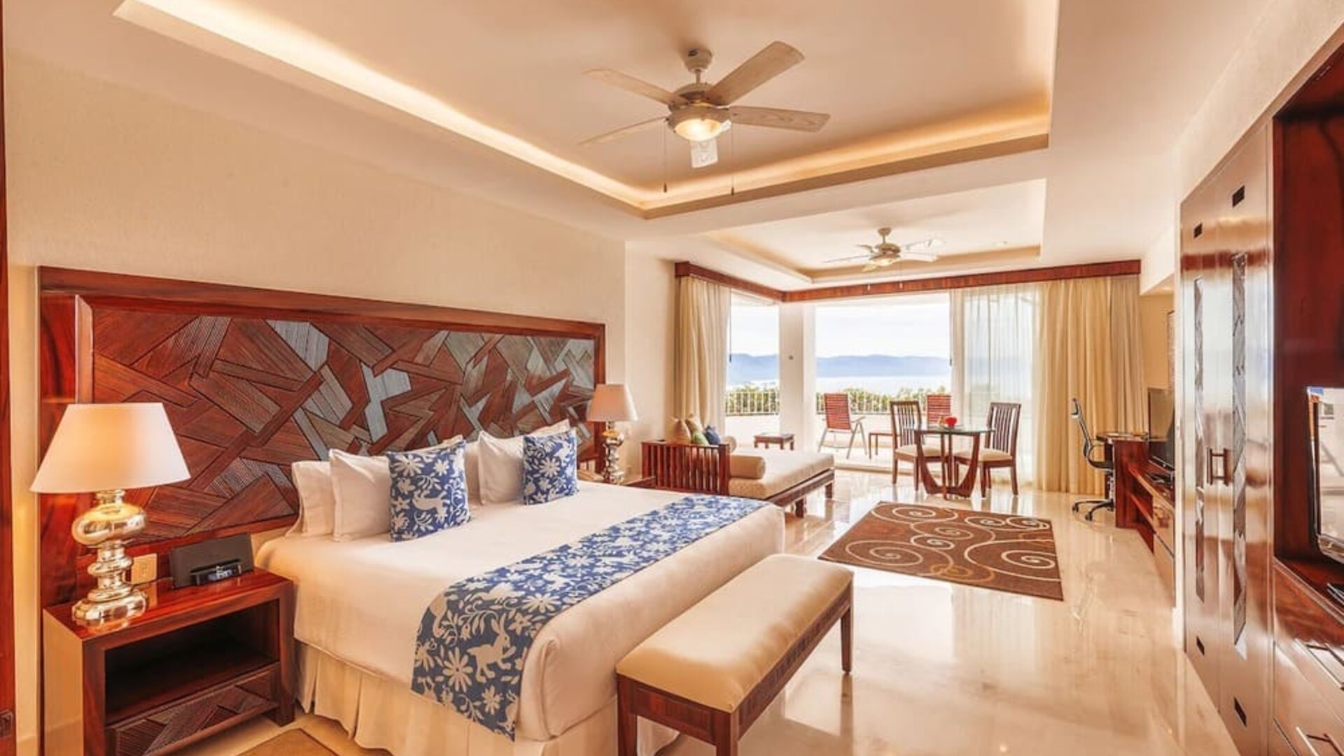 Spacious king room with terrace at Grand Miramar All Luxury Suites & Residences.