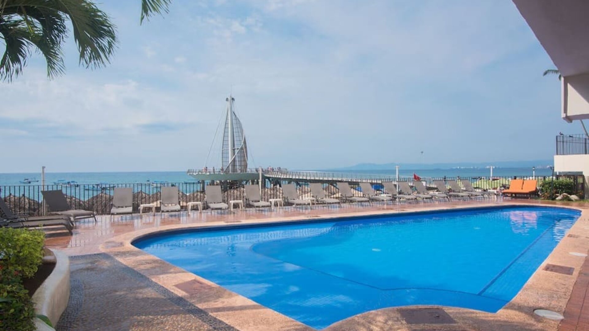 Luxurious outdoor pool at Hotel Delfin PV Beach Resort.