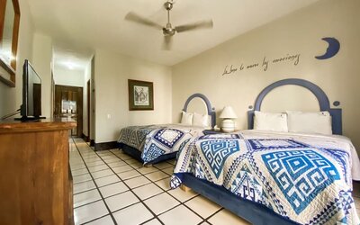 Day use room with fan and AC at Puerto De Luna Pet Friendly & Family Suites.