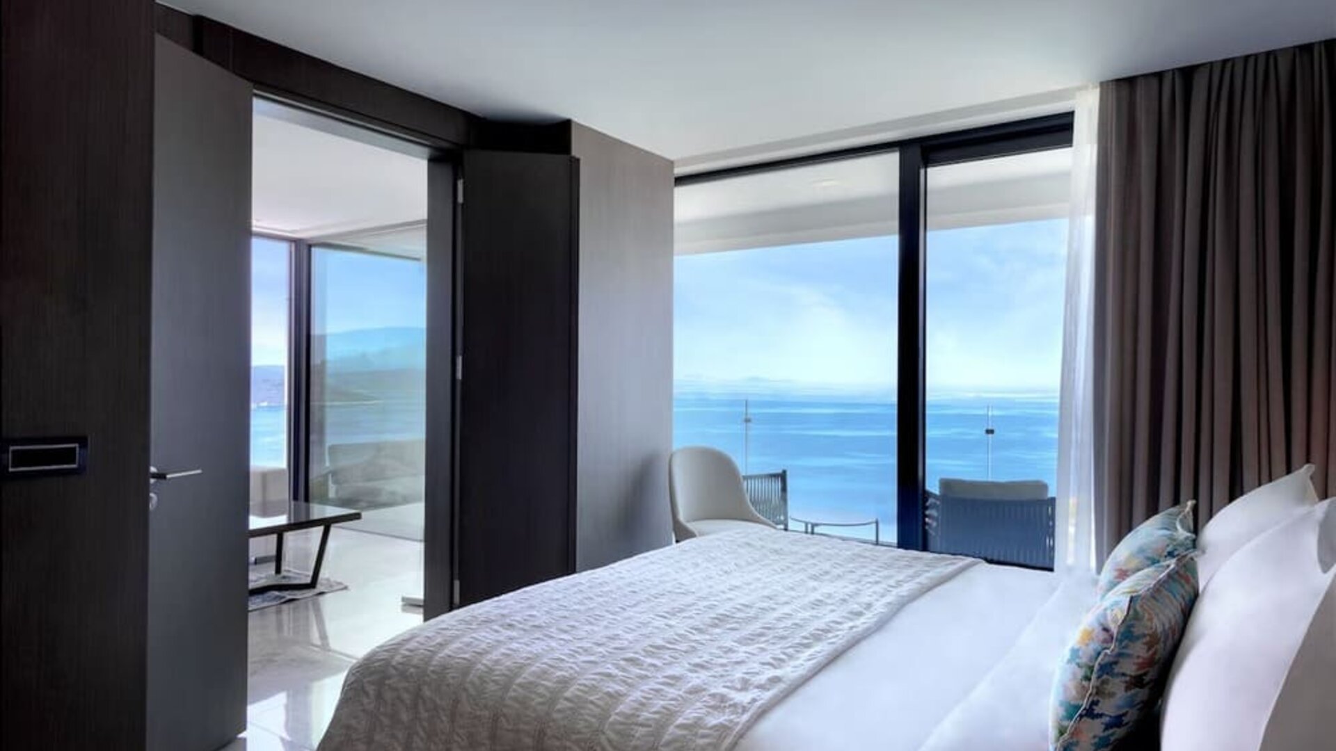 Romantic king room with natural light at Le Méridien Bodrum Beach Resort.