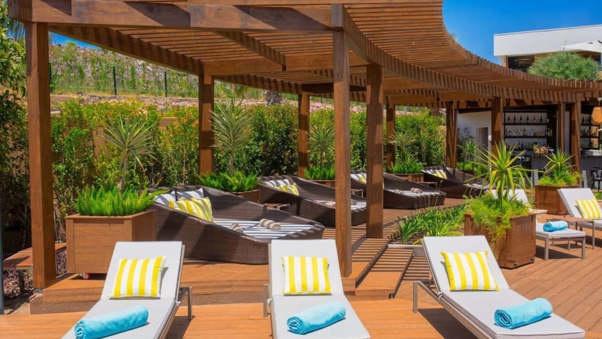 Pool loungers and day beds at Le Méridien Bodrum Beach Resort.