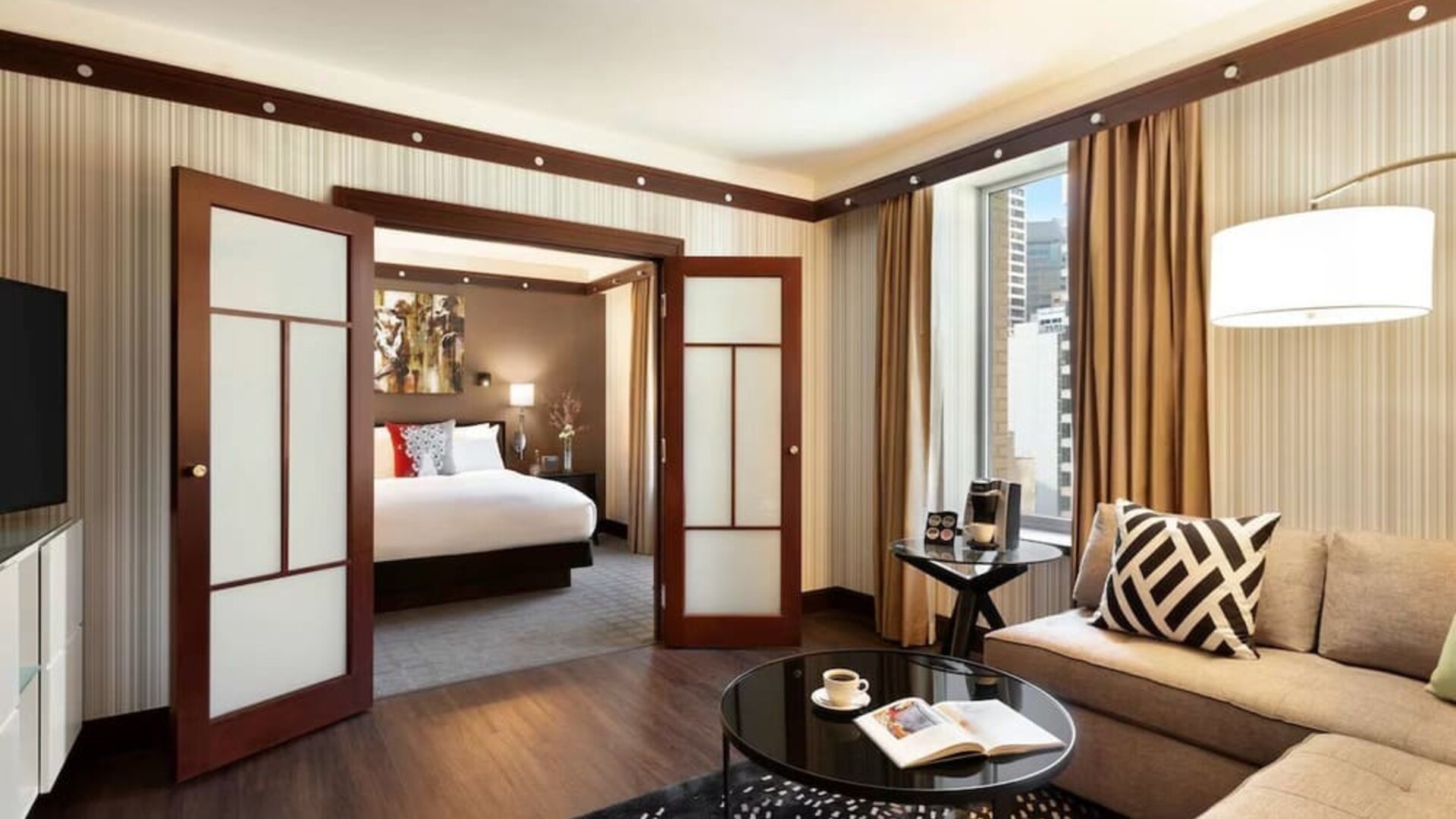 Spacious king suite with lounge area at Sofitel Philadelphia At Rittenhouse Square.