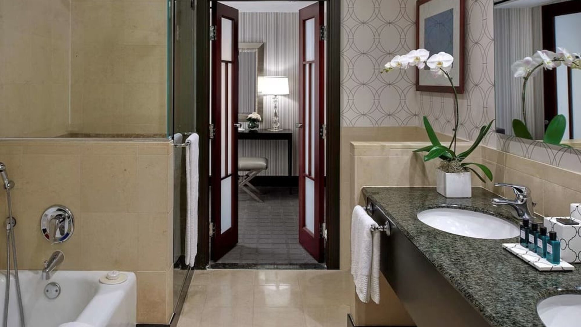 Guest bathroom with shower and bath at Sofitel Philadelphia At Rittenhouse Square.